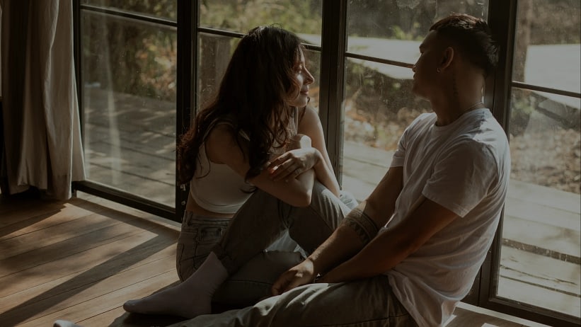 Couple who can communicate well by the window